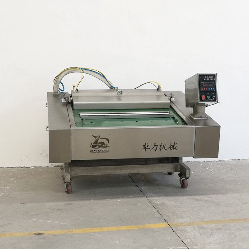 連續(xù)滾動(dòng)式真空包裝機(jī)